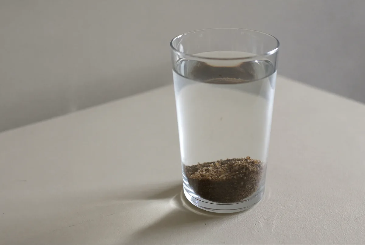 Песок в воде